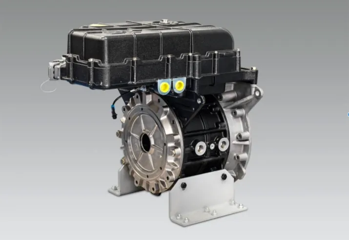 An electric motor and generator unit, key components of a hybrid vehicle's powertrain.